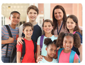 Group of smiling students with teacher